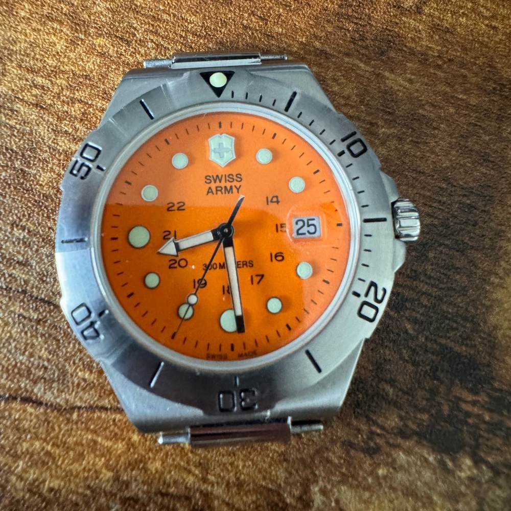 Swiss Army - 300 meters stainless steel watch face only. This is authentic.